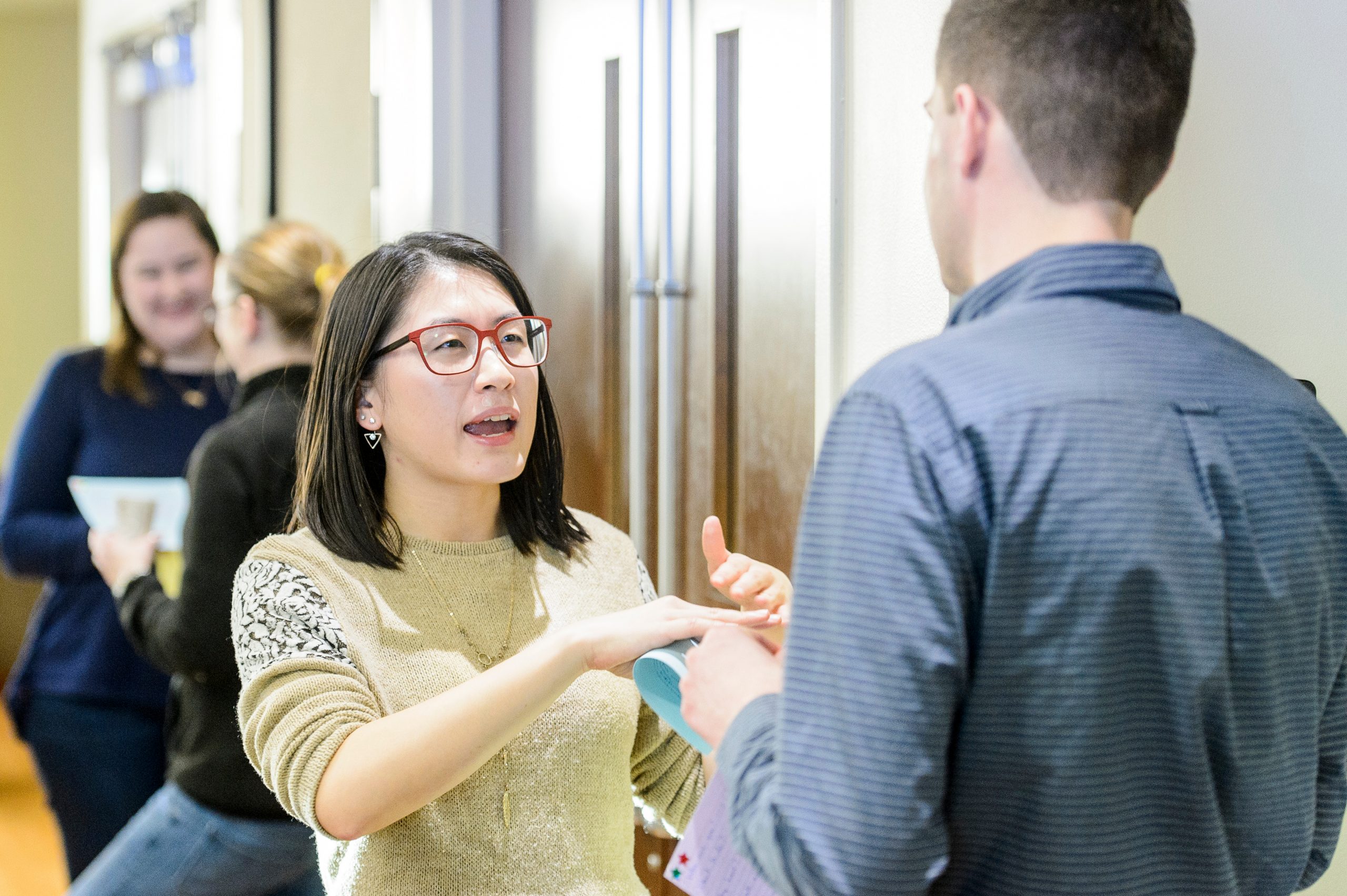MDTP student Edna Chiang networks at a grad school networking event.