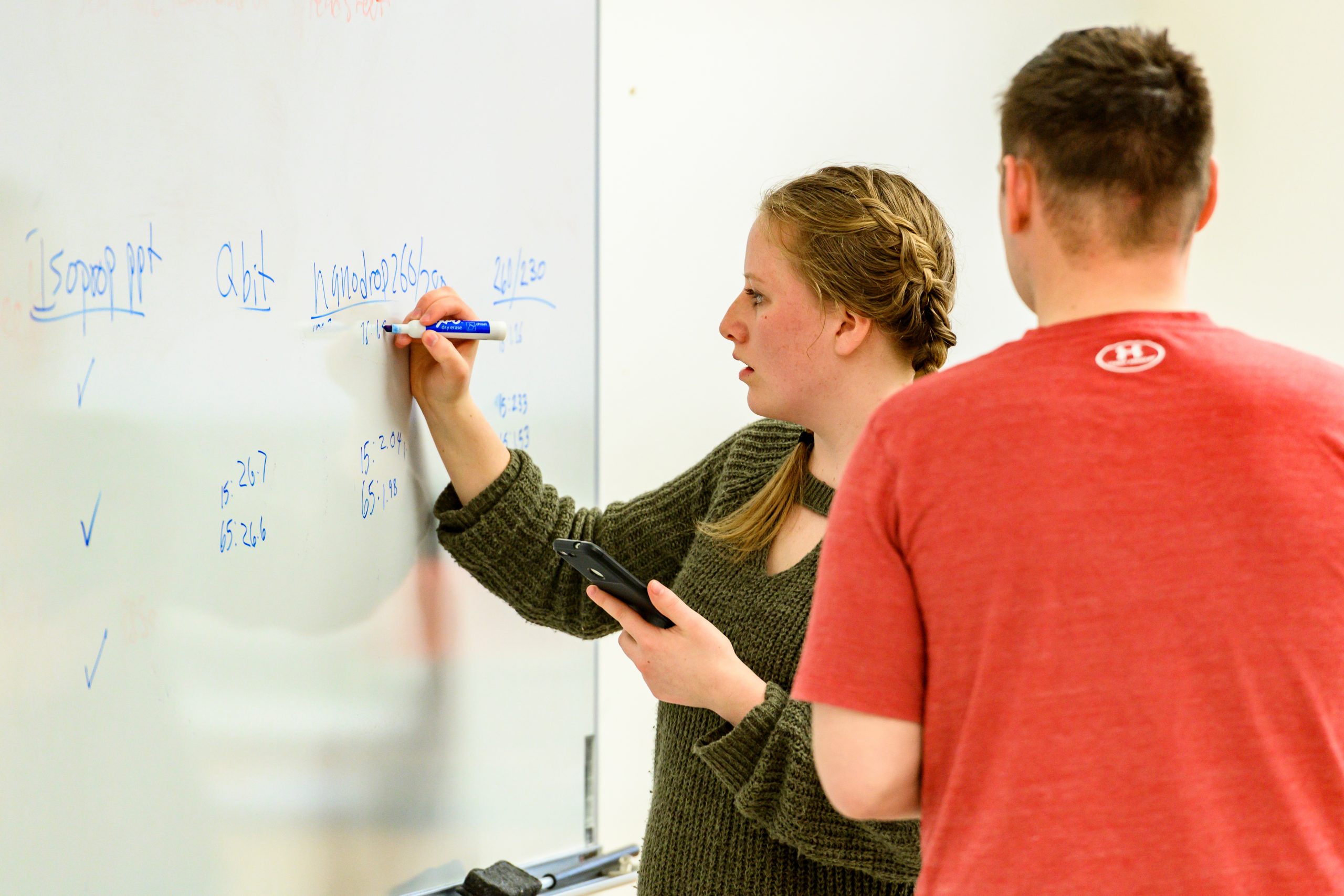 An instructor and student talk